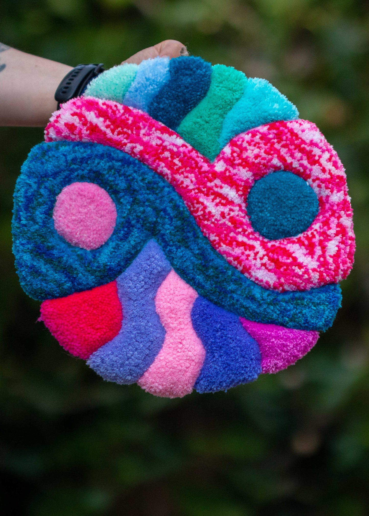 Circular textile wall hanging