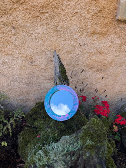 Small circular mirror