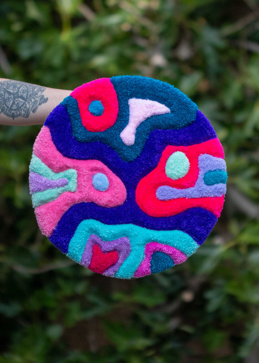 Circular textile wall hanging