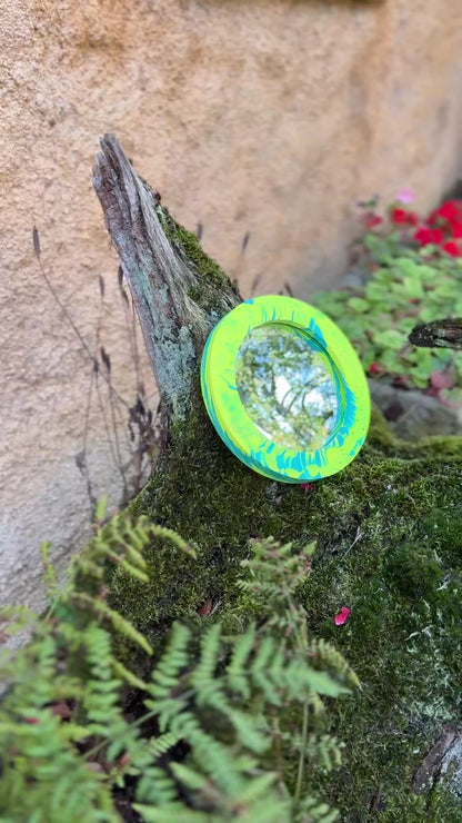 Small circular mirror