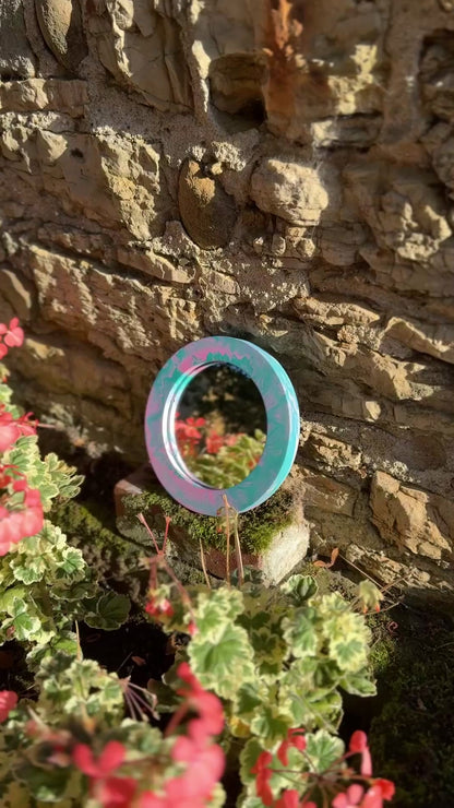 Small circular mirror